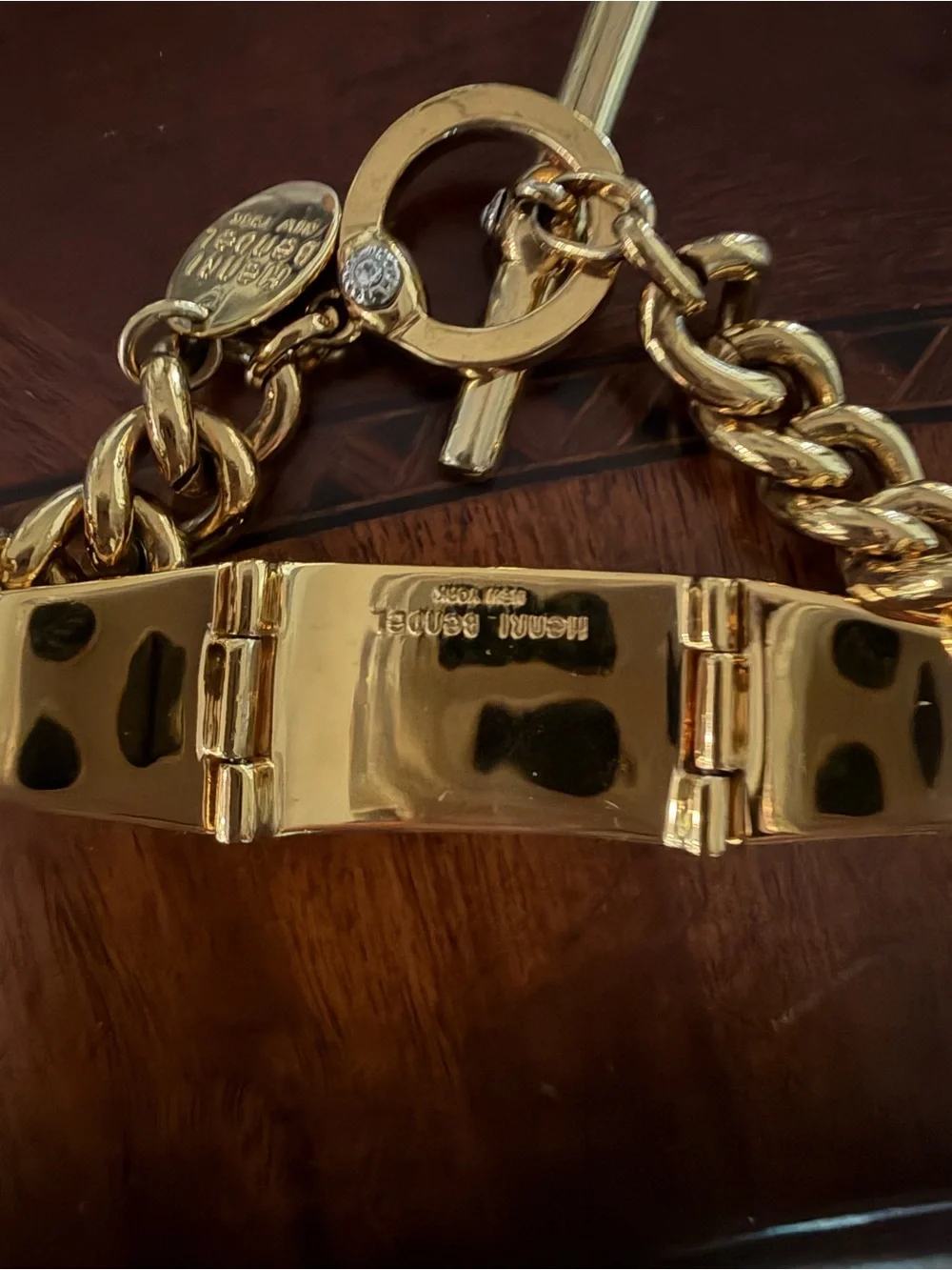 Henri Bendel Gold Tone Bracelet with Green Crystals Toggle Closure 7.5”